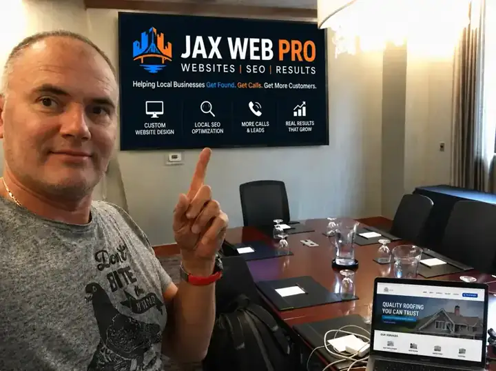 Jax Web Pro founder Alex Zubarev presenting the Jax Web Pro website design and local SEO plan to a Jacksonville FL business owner